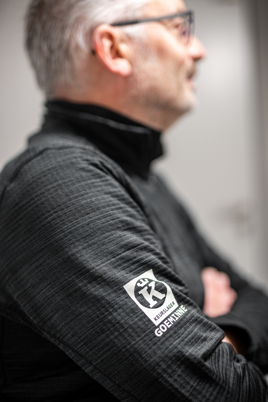 Logo van Keurslager Goeminne op de trui van Jo Logo van Keurslager Goeminne op de trui van Jo