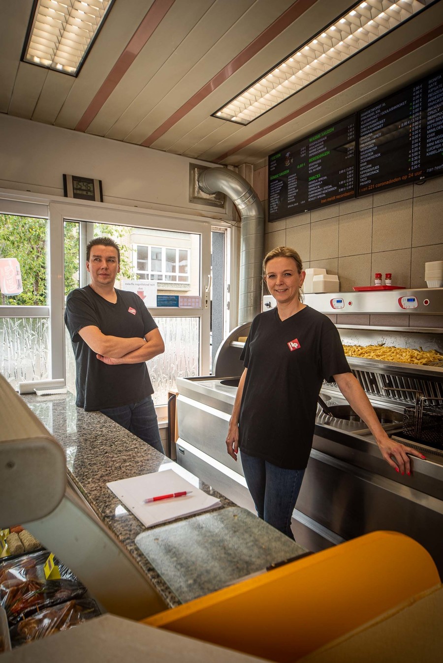 Philip en Kelly achter de toog