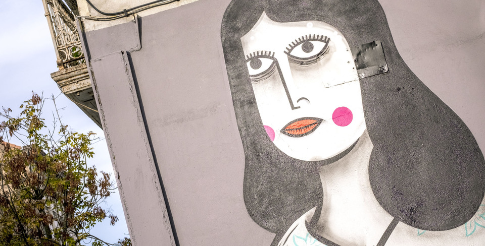 Muurschildering op de zijgevel van een woning