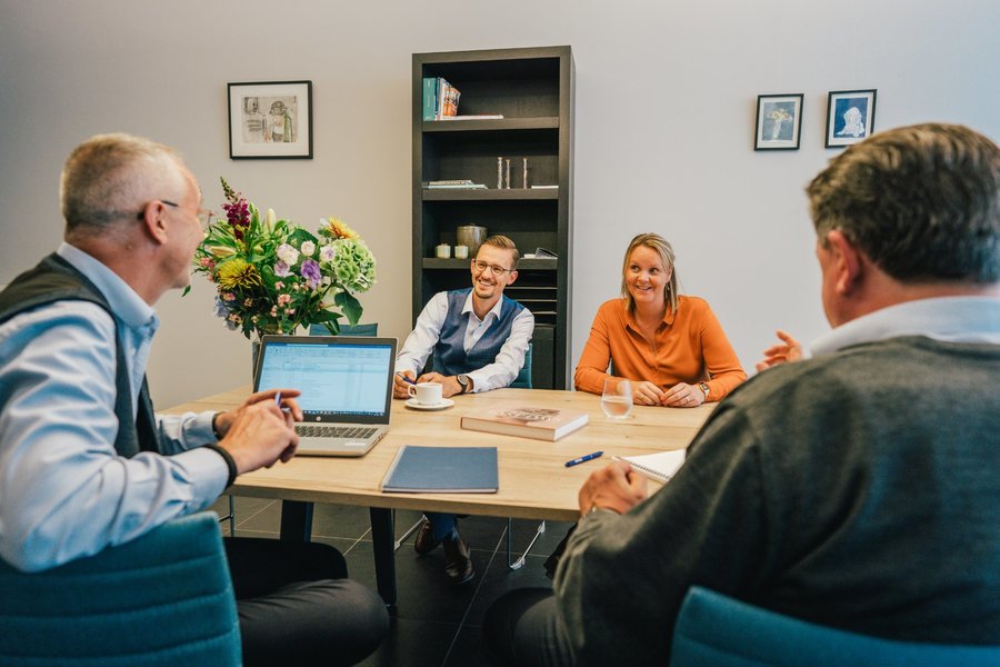 Teammeeting met de collega's